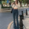 GOUB - High-Waist Washed Bootcut Jeans - Image 9